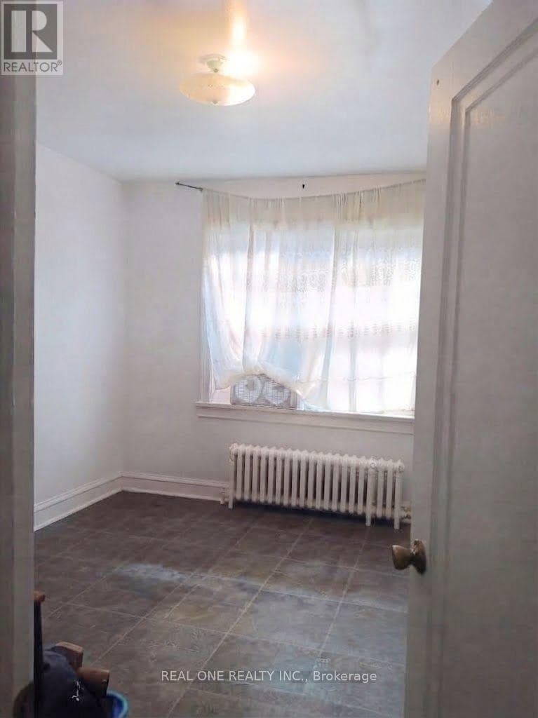 Multi-family at 2- 104 Twenty Fifth Street, Toronto (Long Branch), Ontario - Photo 4 - RE/MAX Garden City Realty