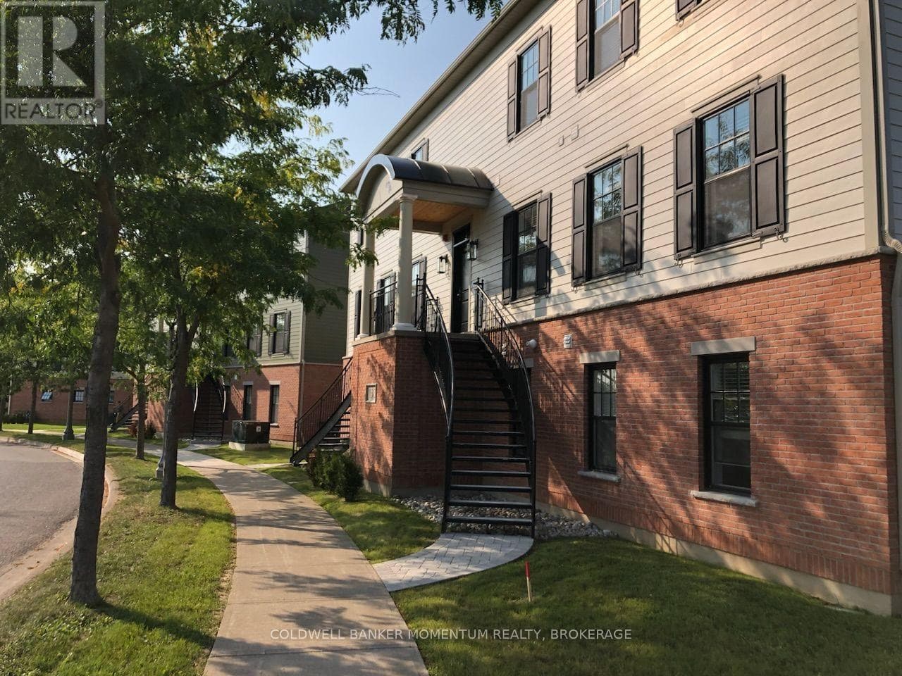 Multi-family at 101- 120 Garrison Village Drive, Niagara-on-the-Lake (Town), Ontario - Photo 3 - RE/MAX Garden City Realty