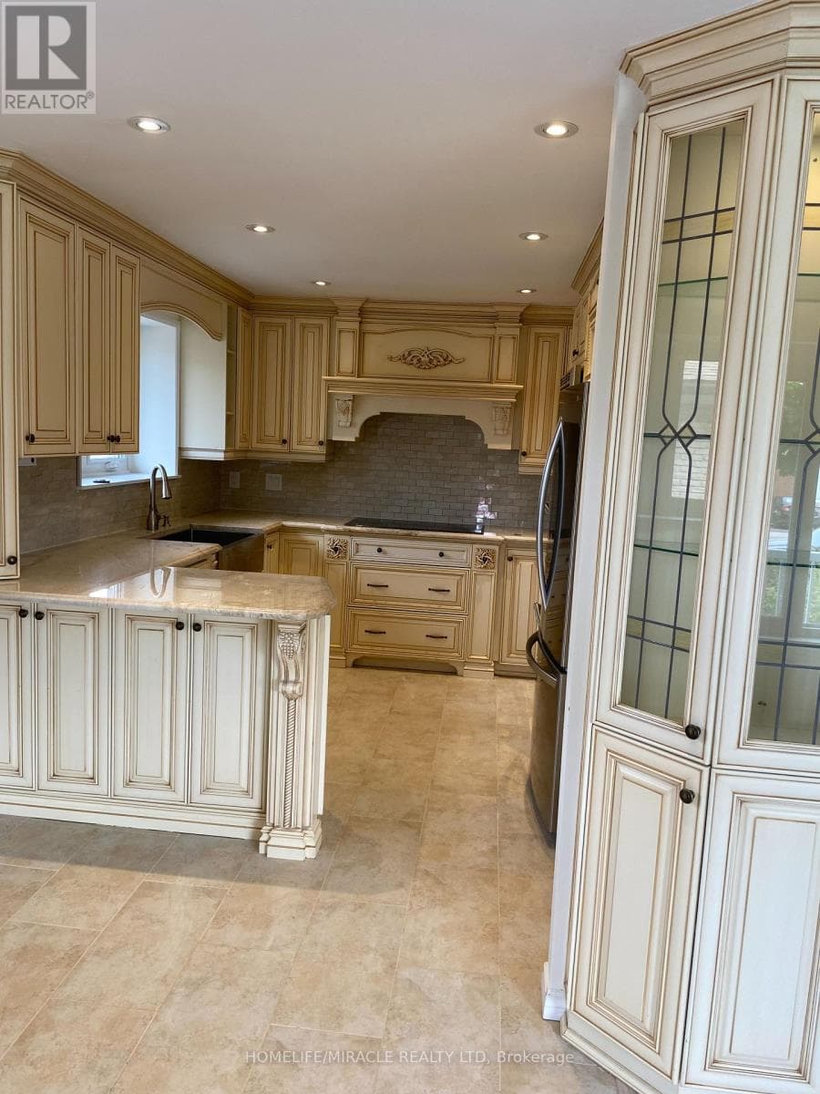 Single Family at 6856 Darcel Avenue, Mississauga (Malton), Ontario - Photo 4 - RE/MAX Garden City Realty