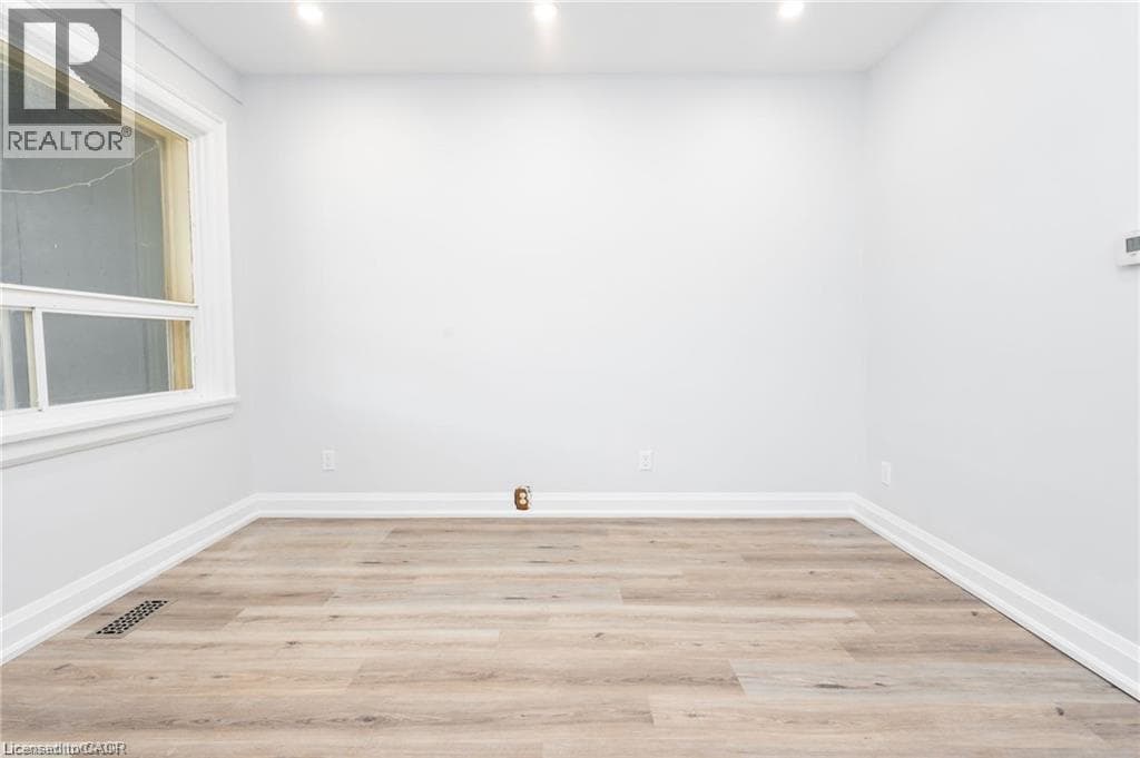Single Family at 100 ROSETHORN Avenue, Toronto, Ontario - Photo 4 - RE/MAX Garden City Realty