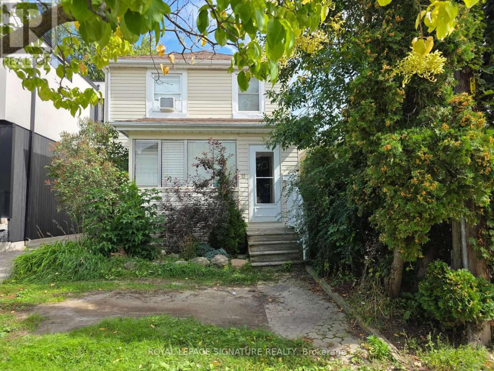 Single Family at 15 Twenty-Ninth Street, Toronto (Long Branch), Ontario - Photo 1 - RE/MAX Garden City Realty