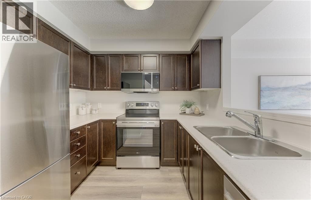 Single Family at 975 ZELLER Crescent, Kitchener, Ontario - Photo 4 - RE/MAX Garden City Realty