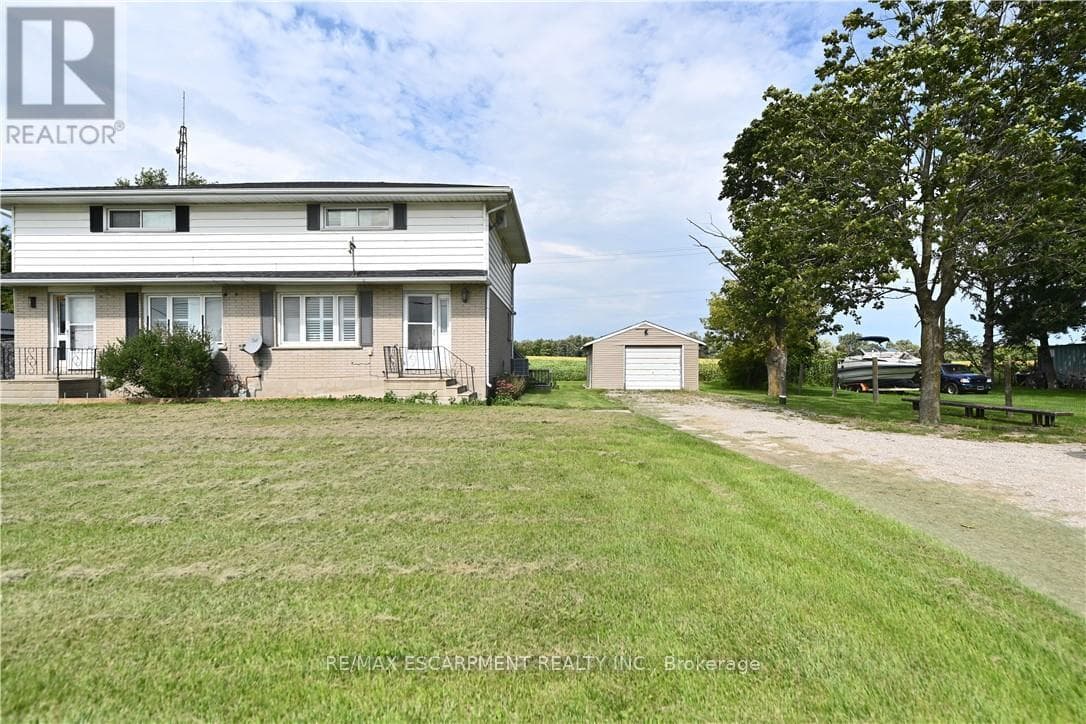 Single Family at Right Side- 685717 Hwy 2, Woodstock (Woodstock - North), Ontario - Photo 1 - RE/MAX Garden City Realty
