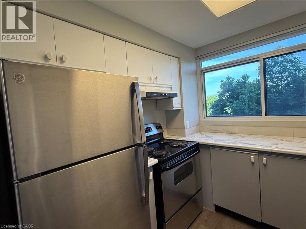 Single Family at 404- 20 ELLEN Street, Waterloo, Ontario - Photo 9 - RE/MAX Garden City Realty