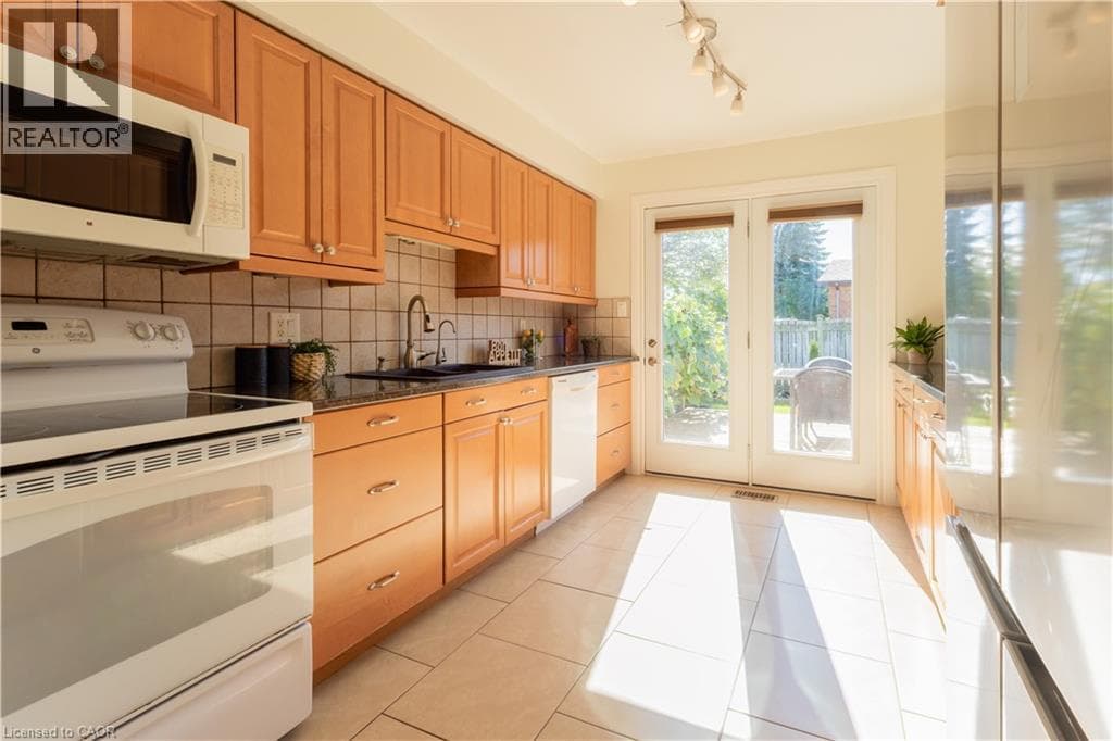 Single Family at 588 DRUMMERHILL Crescent, Waterloo, Ontario - Photo 7 - RE/MAX Garden City Realty