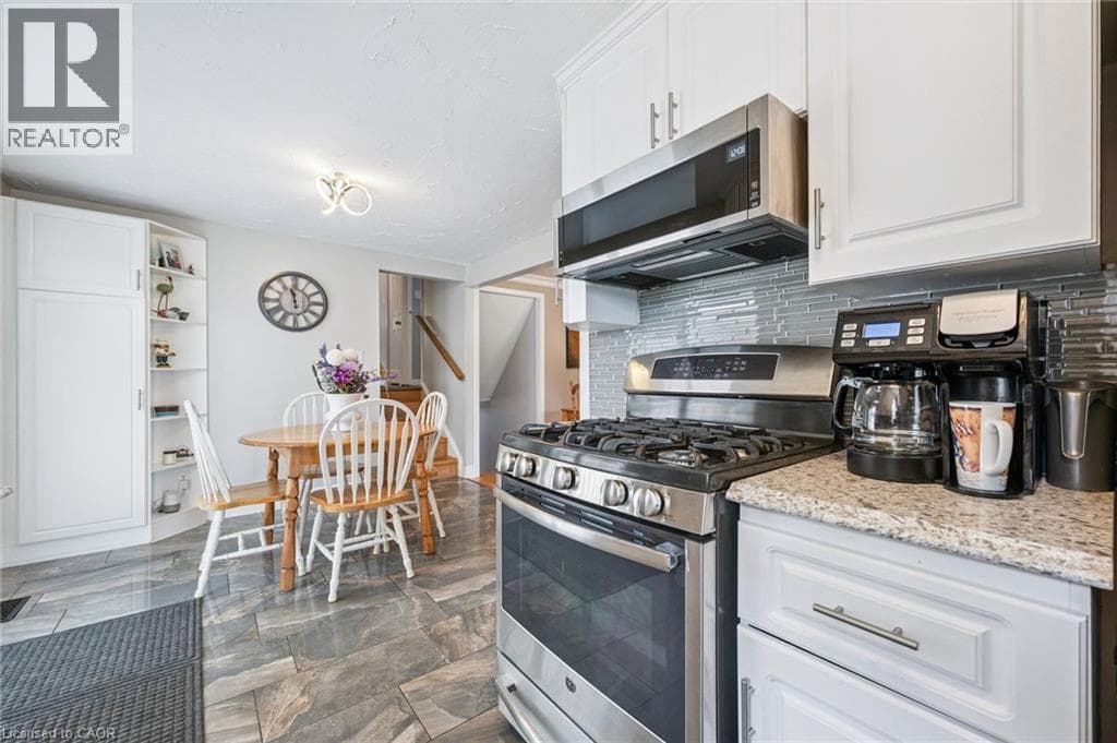 Single Family at 847 DOON VILLAGE Road, Kitchener, Ontario - Photo 6 - RE/MAX Garden City Realty