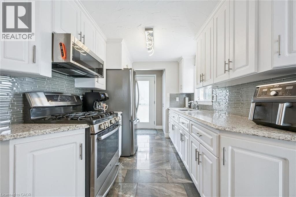Single Family at 847 DOON VILLAGE Road, Kitchener, Ontario - Photo 7 - RE/MAX Garden City Realty
