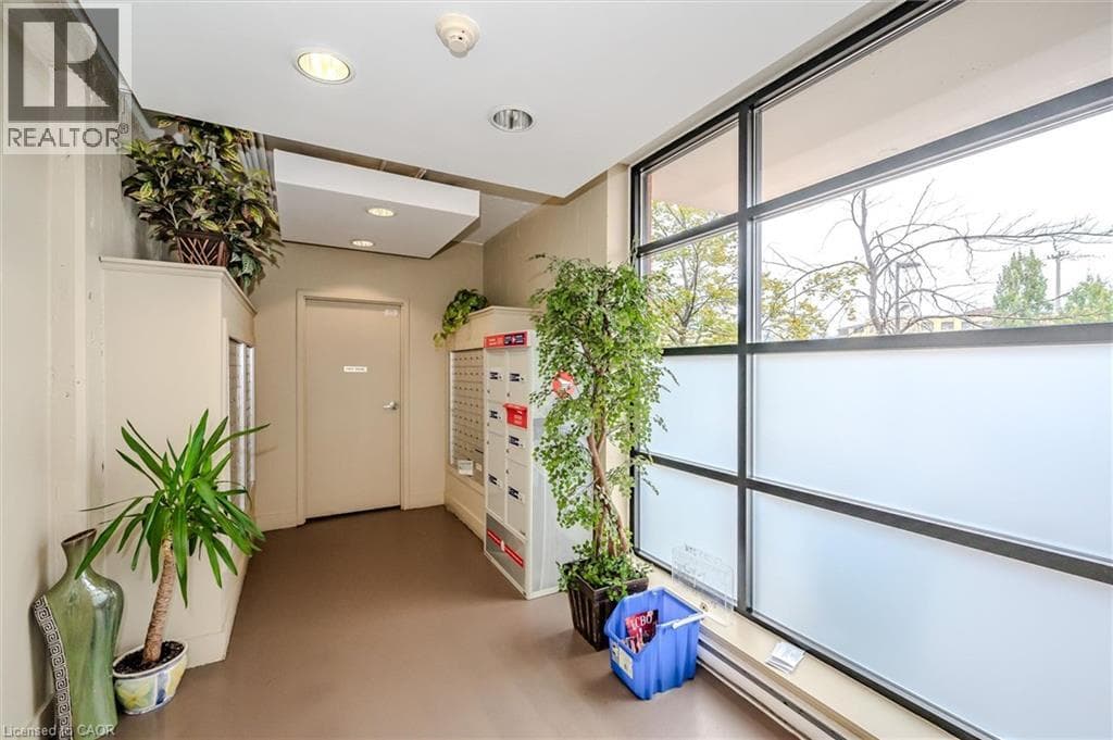 Single Family at 112- 410 KING W/S Street, Kitchener, Ontario - Photo 3 - RE/MAX Garden City Realty