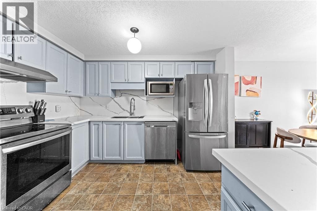 Single Family at 245 RED CLOVER Court, Kitchener, Ontario - Photo 7 - RE/MAX Garden City Realty