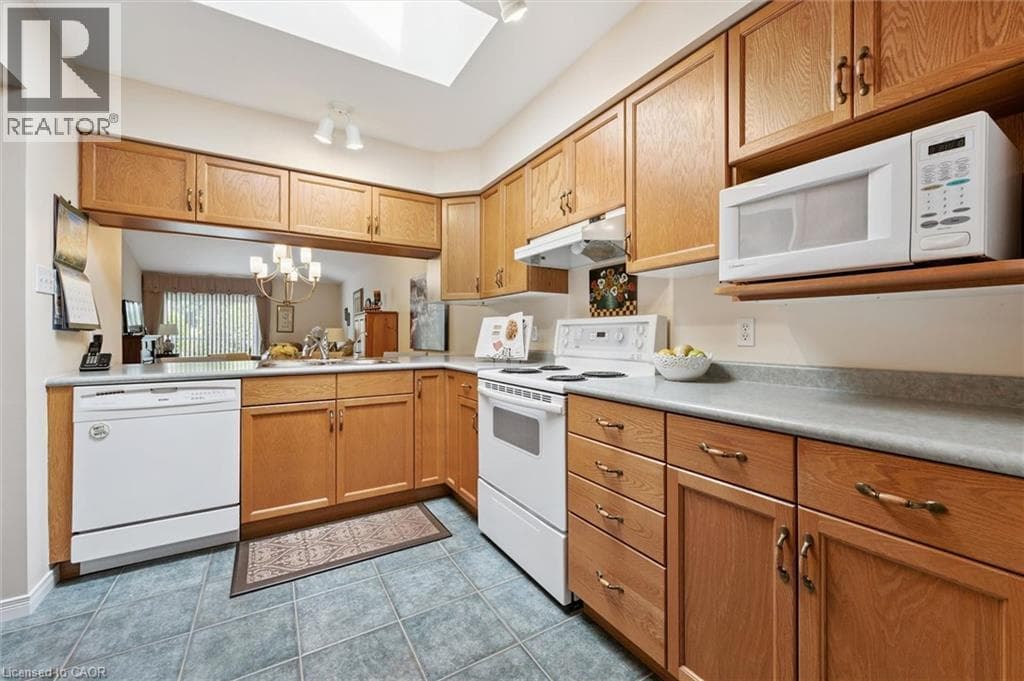 Single Family at 658 ELLESMERE Court, Waterloo, Ontario - Photo 8 - RE/MAX Garden City Realty