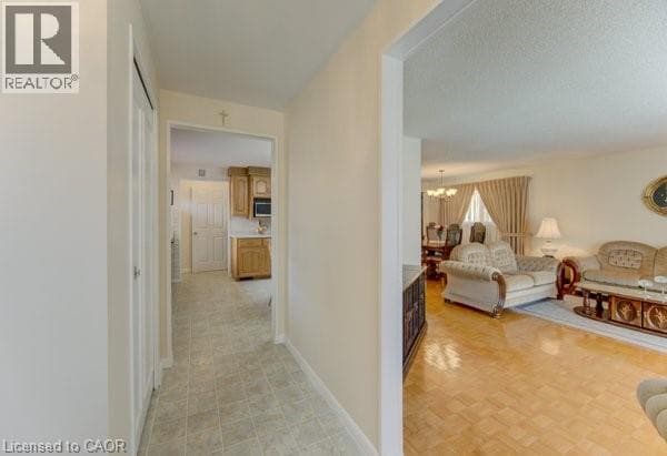 Single Family at 141 HAZELGLEN Drive, Kitchener, Ontario - Photo 6 - RE/MAX Garden City Realty