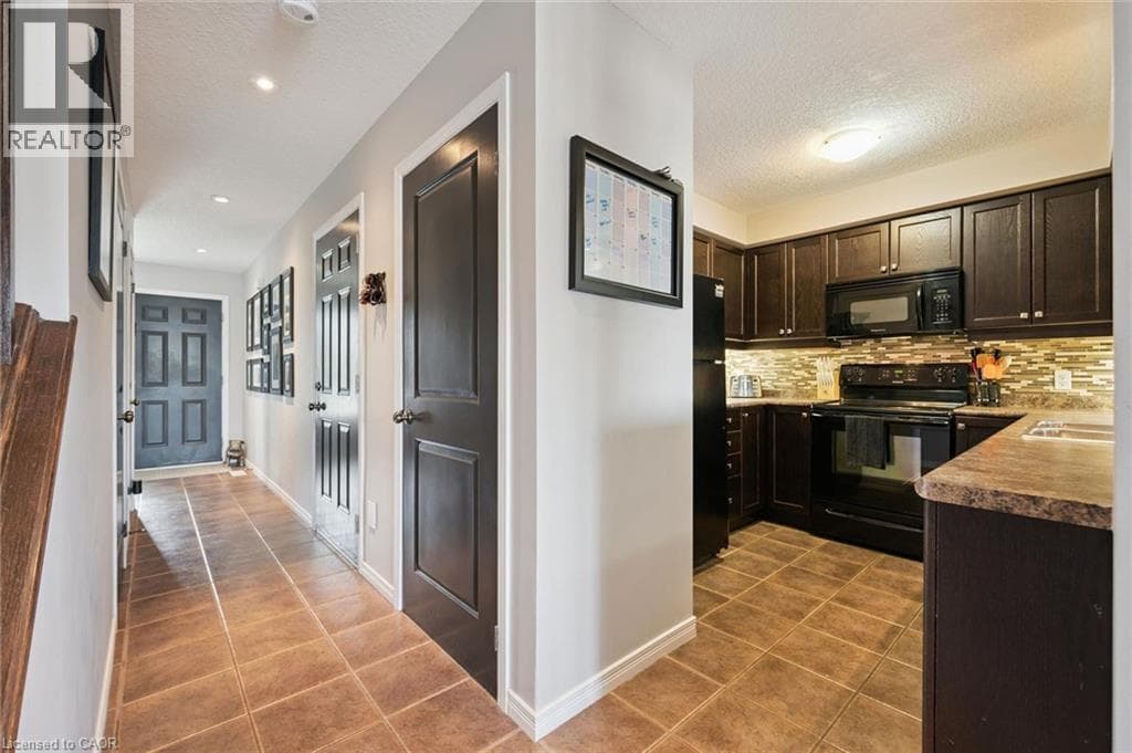 Single Family at 915 ZELLER Crescent, Kitchener, Ontario - Photo 9 - RE/MAX Garden City Realty