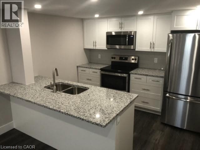 Single Family at 805 ROCKWAY Drive, Kitchener, Ontario - Photo 10 - RE/MAX Garden City Realty