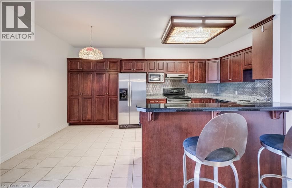 Single Family at 1403- 255 KEATS Way, Waterloo, Ontario - Photo 6 - RE/MAX Garden City Realty