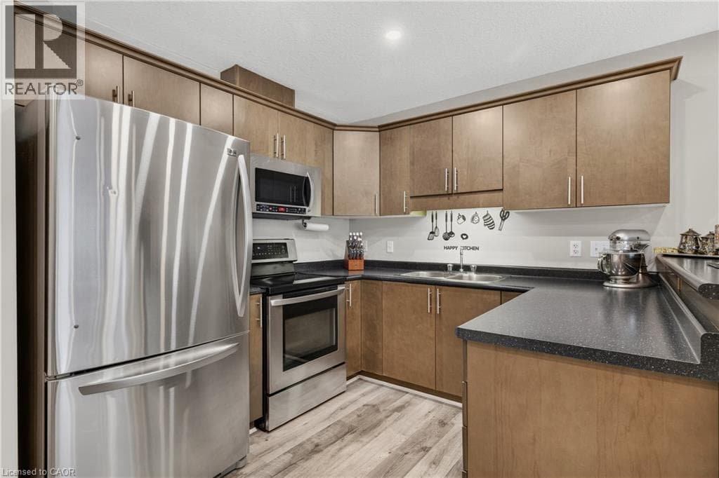 Single Family at 4- 975 STRASBURG Road, Kitchener, Ontario - Photo 4 - RE/MAX Garden City Realty
