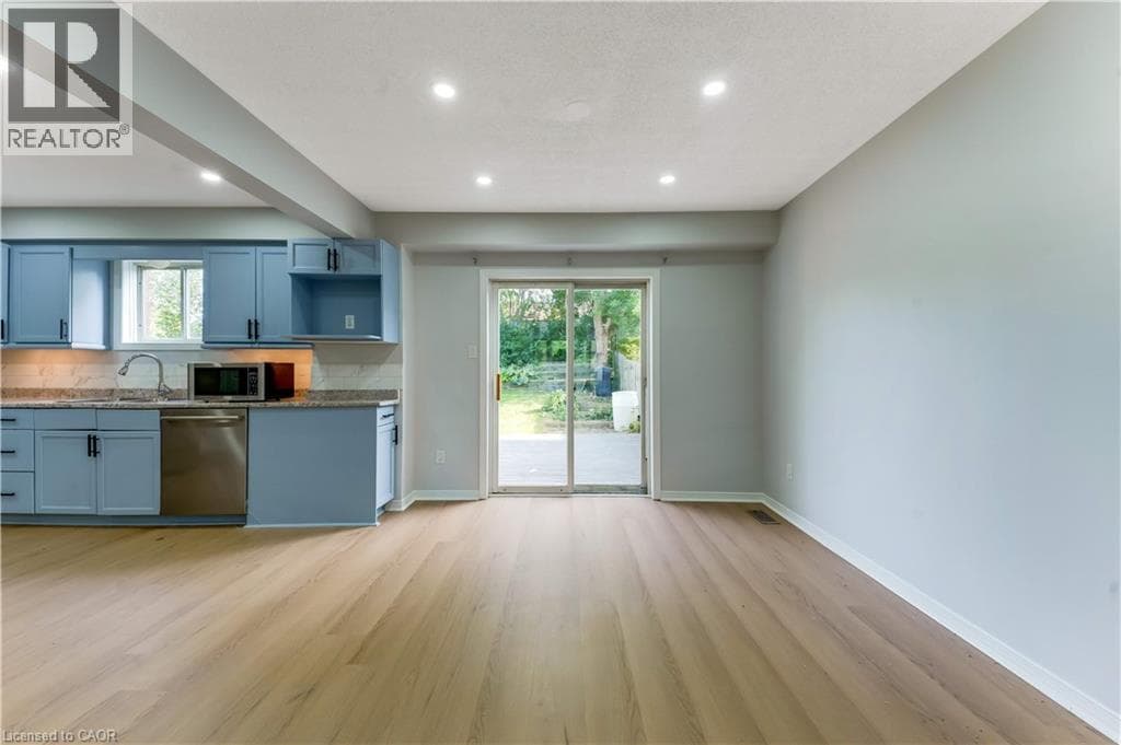 Single Family at 68 OLD HURON Court, Kitchener, Ontario - Photo 8 - RE/MAX Garden City Realty