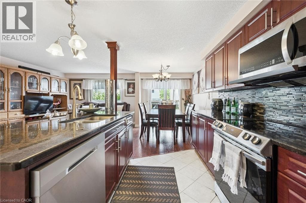Single Family at 86 BRIDLEWREATH Street, Kitchener, Ontario - Photo 7 - RE/MAX Garden City Realty