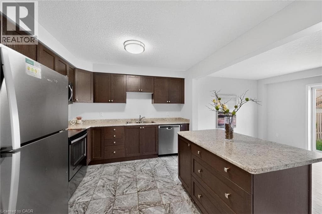 Single Family at 73 GRAND FLATS Trail, Kitchener, Ontario - Photo 6 - RE/MAX Garden City Realty