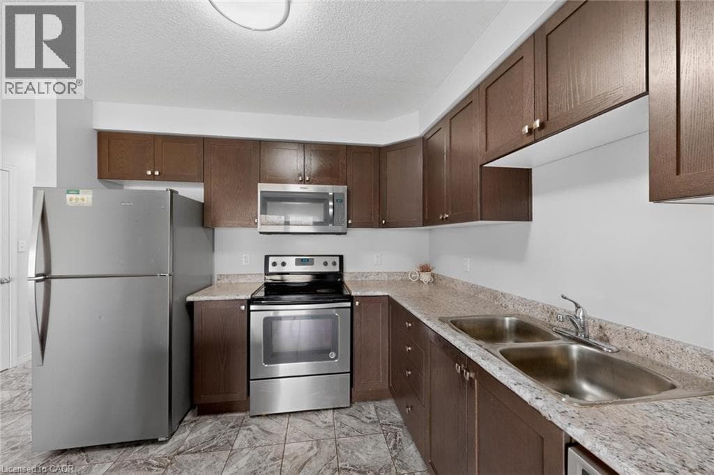 Single Family at 73 GRAND FLATS Trail, Kitchener, Ontario - Photo 9 - RE/MAX Garden City Realty