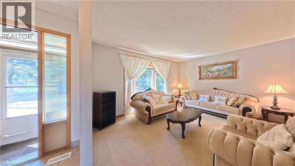 Single Family at 56 SCENIC WOOD Crescent, Kitchener, Ontario - Photo 3 - RE/MAX Garden City Realty
