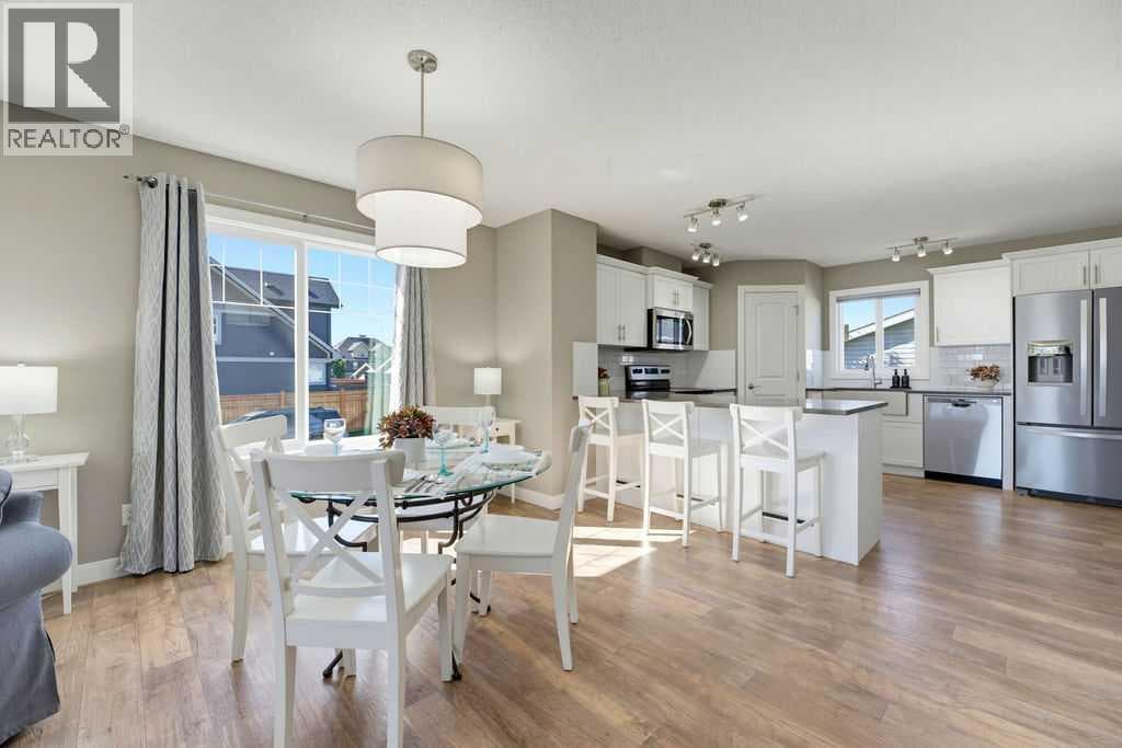 Single Family at 115 Heartland Boulevard, Cochrane, Alberta - Photo 10 - RE/MAX Garden City Realty
