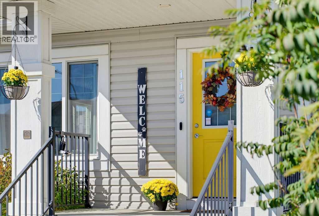 Single Family at 115 Heartland Boulevard, Cochrane, Alberta - Photo 2 - RE/MAX Garden City Realty