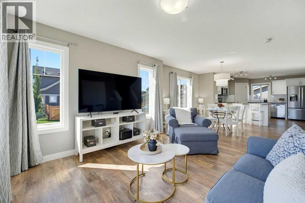 Single Family at 115 Heartland Boulevard, Cochrane, Alberta - Photo 8 - RE/MAX Garden City Realty