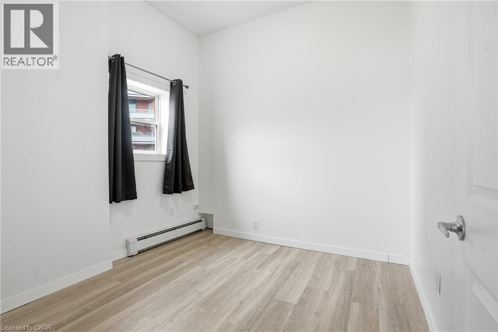 Multi-family at 14 AVENUE Place, Welland, Ontario - Photo 6 - RE/MAX Garden City Realty