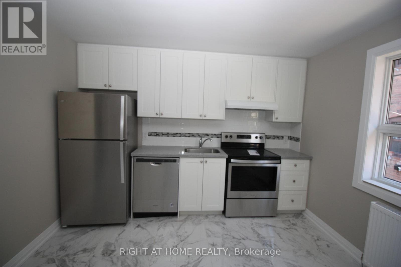 Multi-family at 4- 2 Glen Gordon Road, Toronto (High Park North), Ontario - Photo 2 - RE/MAX Garden City Realty