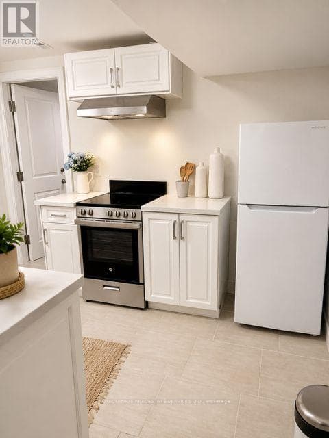Single Family at Lower- 17 Longfield Road, Toronto (Princess-Rosethorn), Ontario - Photo 2 - RE/MAX Garden City Realty