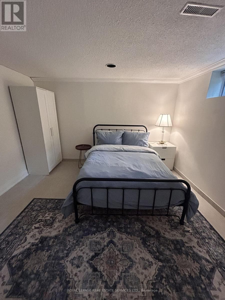 Single Family at Lower- 17 Longfield Road, Toronto (Princess-Rosethorn), Ontario - Photo 5 - RE/MAX Garden City Realty