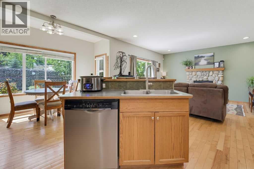 Single Family at 11 Bow Ridge Link, Cochrane, Alberta - Photo 10 - RE/MAX Garden City Realty