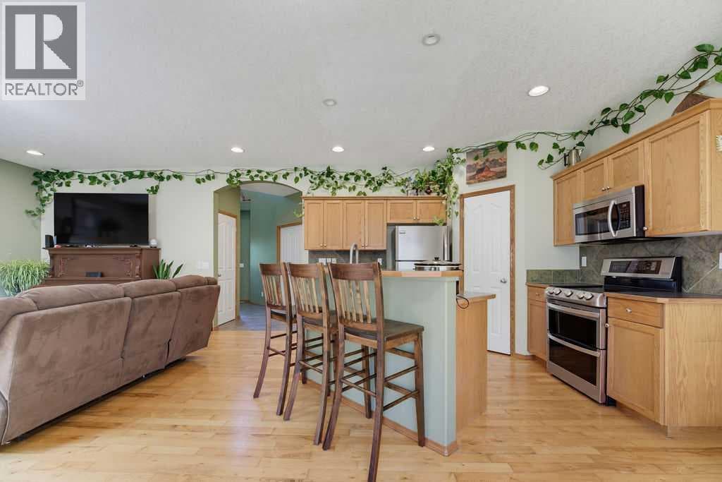Single Family at 11 Bow Ridge Link, Cochrane, Alberta - Photo 6 - RE/MAX Garden City Realty