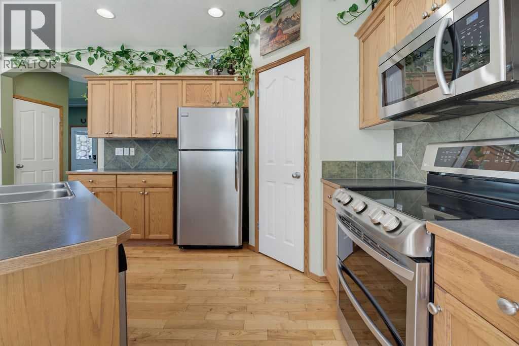 Single Family at 11 Bow Ridge Link, Cochrane, Alberta - Photo 8 - RE/MAX Garden City Realty