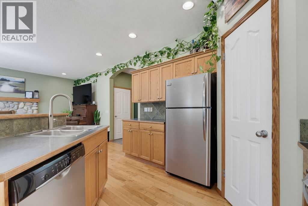 Single Family at 11 Bow Ridge Link, Cochrane, Alberta - Photo 9 - RE/MAX Garden City Realty