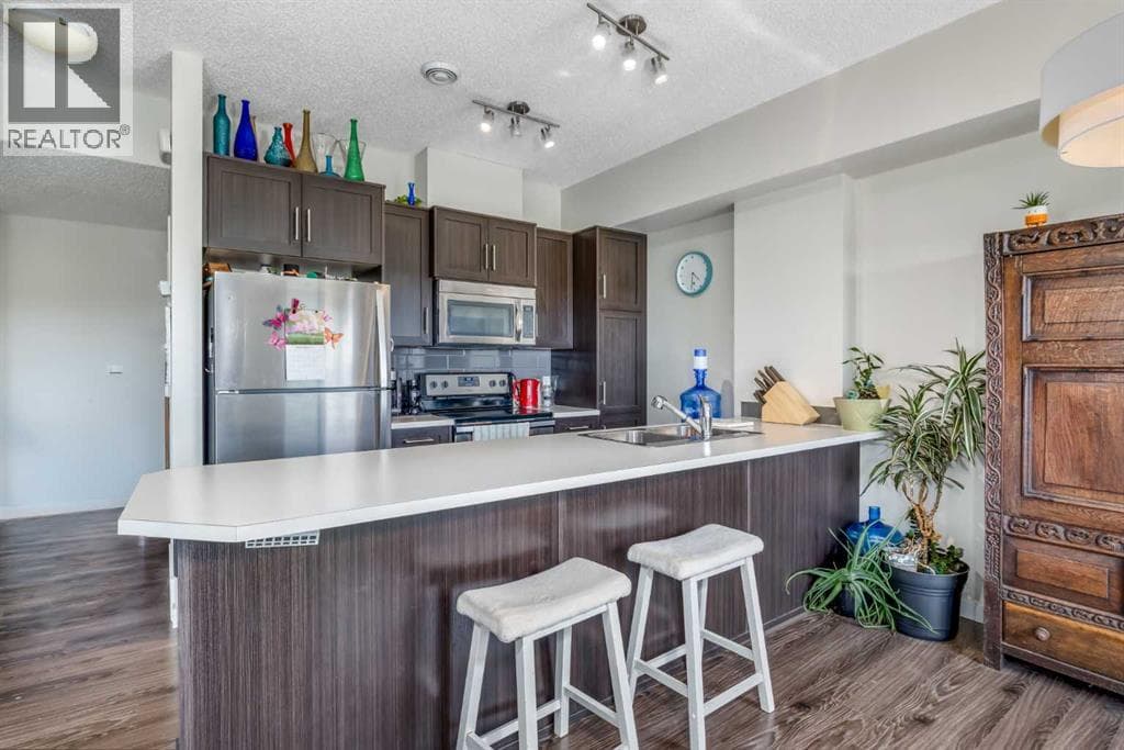 Single Family at 250 FIRESIDE View, Cochrane, Alberta - Photo 4 - RE/MAX Garden City Realty