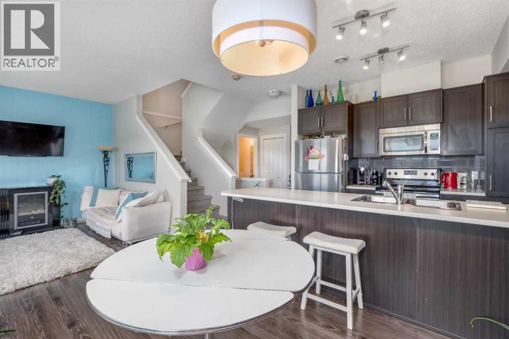 Single Family at 250 FIRESIDE View, Cochrane, Alberta - Photo 6 - RE/MAX Garden City Realty