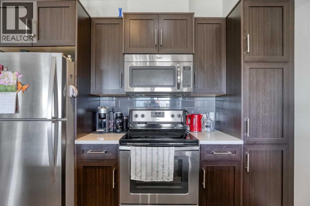Single Family at 250 FIRESIDE View, Cochrane, Alberta - Photo 3 - RE/MAX Garden City Realty