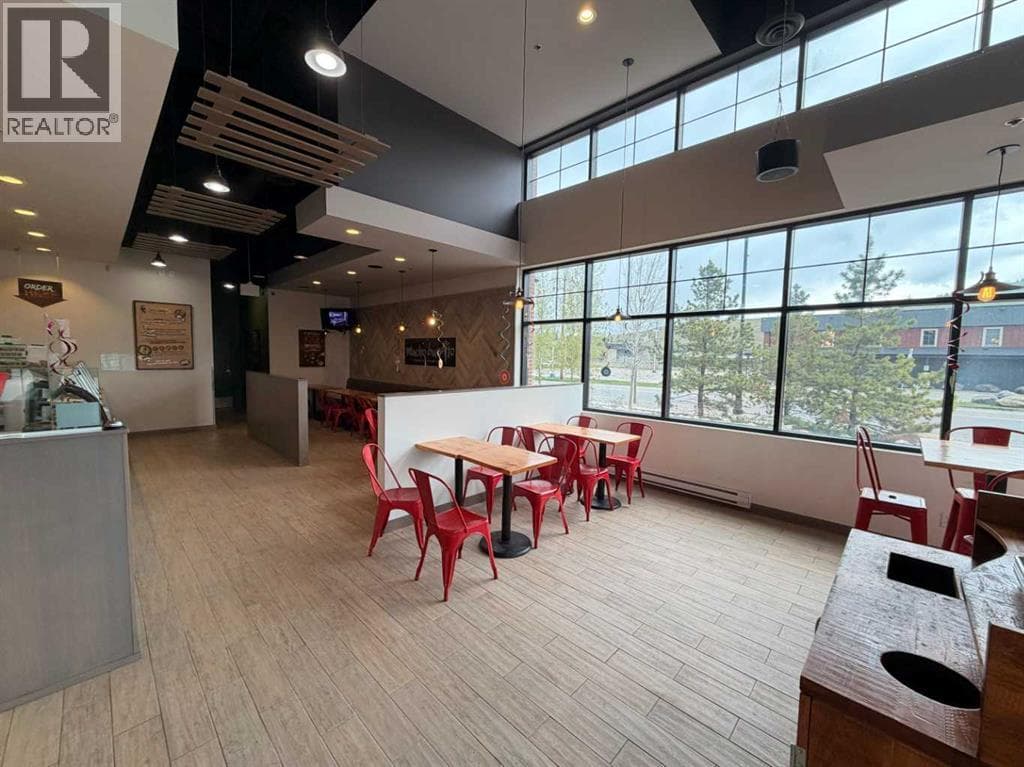 Business at 31 Bow St Common, Cochrane, Alberta - Photo 3 - RE/MAX Garden City Realty