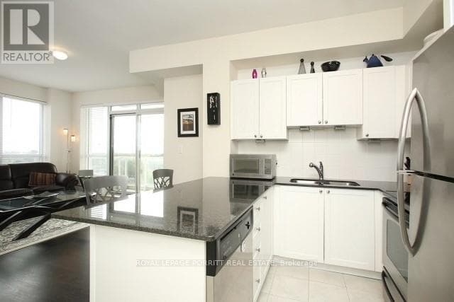 Single Family at 1109- 3865 Lake Shore Boulevard, Toronto (Long Branch), Ontario - Photo 2 - RE/MAX Garden City Realty