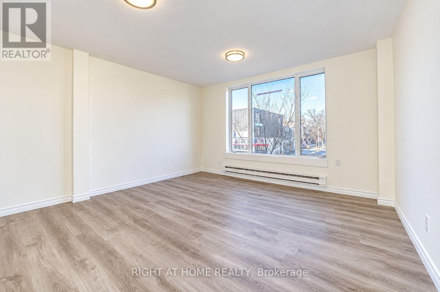 Single Family at Upper- 843 Danforth Avenue, Toronto (Blake-Jones), Ontario - Photo 4 - RE/MAX Garden City Realty