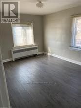 Multi-family at 5- 5473 Ontario Avenue, Niagara Falls (Downtown), Ontario - Photo 3 - RE/MAX Garden City Realty