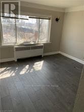 Multi-family at 5- 5473 Ontario Avenue, Niagara Falls (Downtown), Ontario - Photo 4 - RE/MAX Garden City Realty
