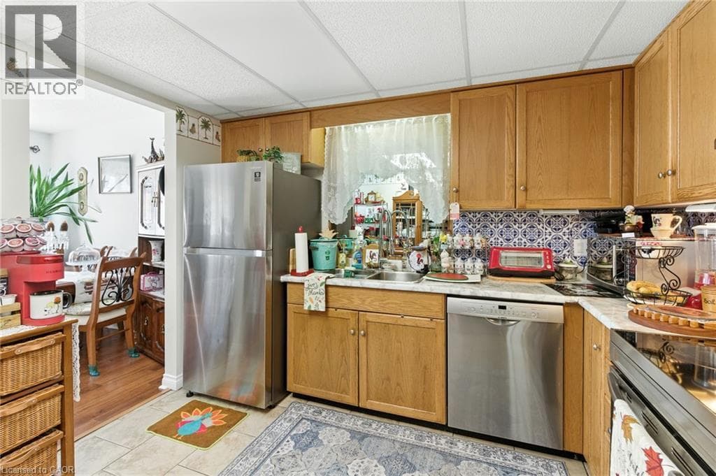 Single Family at 104- 6381 DUNN Street, Niagara Falls, Ontario - Photo 4 - RE/MAX Garden City Realty