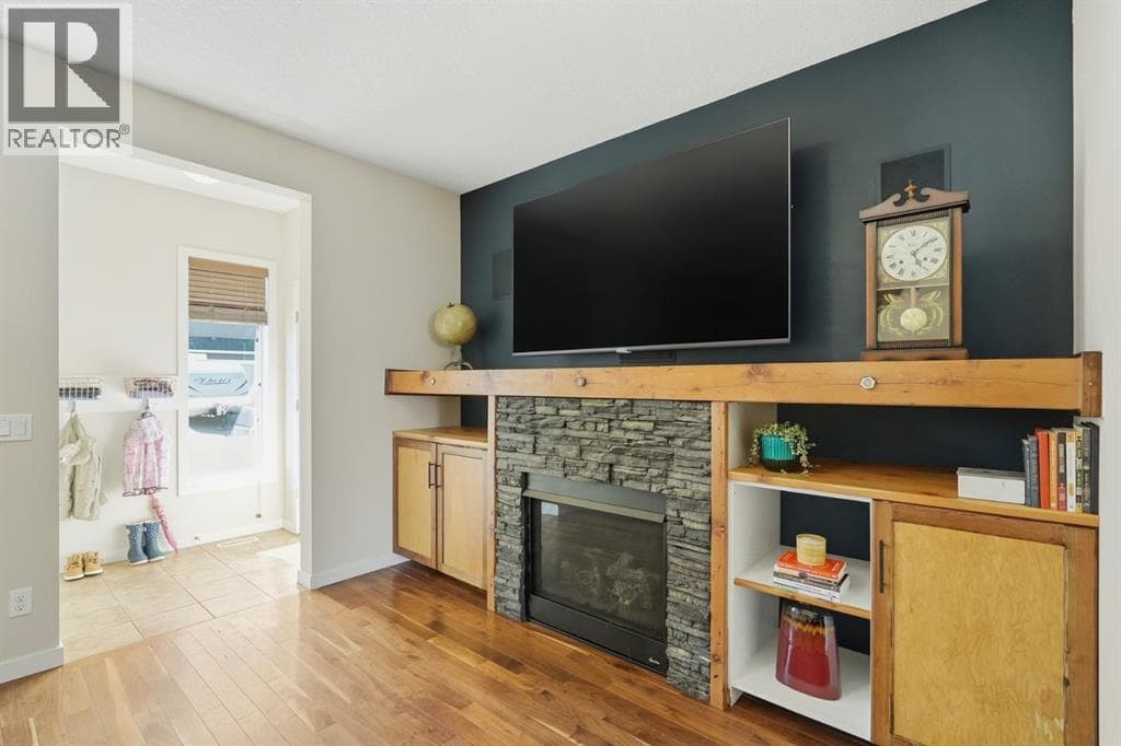 Single Family at 110 Fireside Cove, Cochrane, Alberta - Photo 4 - RE/MAX Garden City Realty
