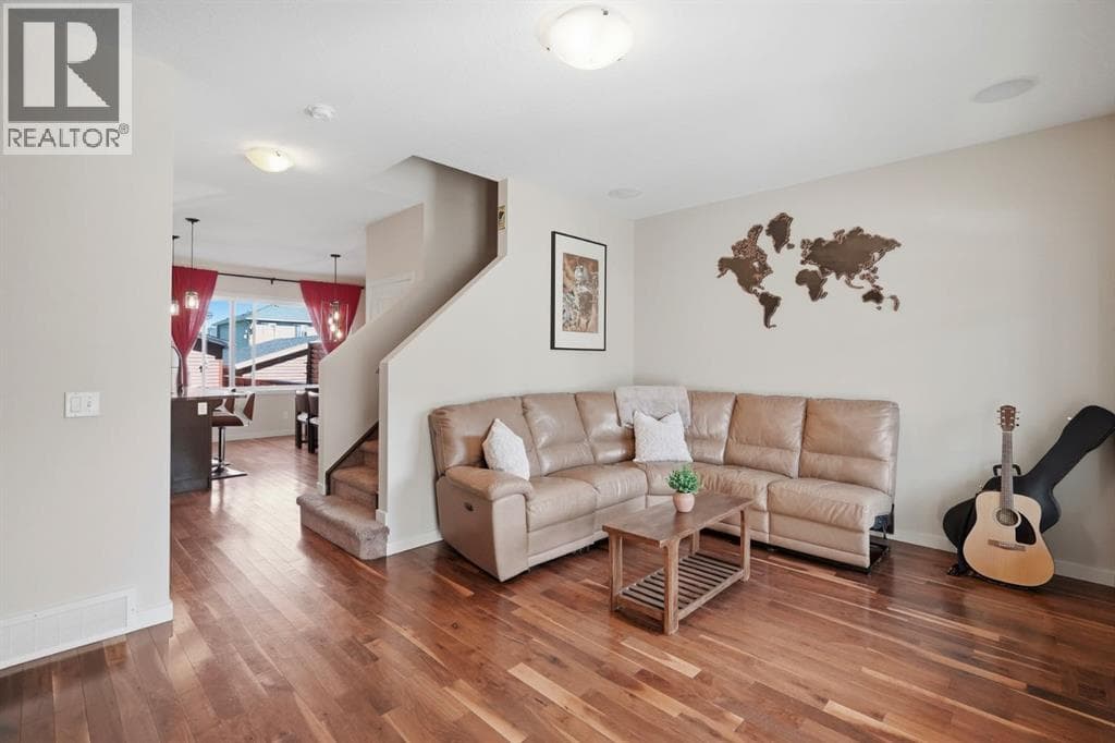 Single Family at 110 Fireside Cove, Cochrane, Alberta - Photo 2 - RE/MAX Garden City Realty