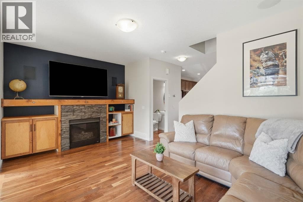 Single Family at 110 Fireside Cove, Cochrane, Alberta - Photo 3 - RE/MAX Garden City Realty