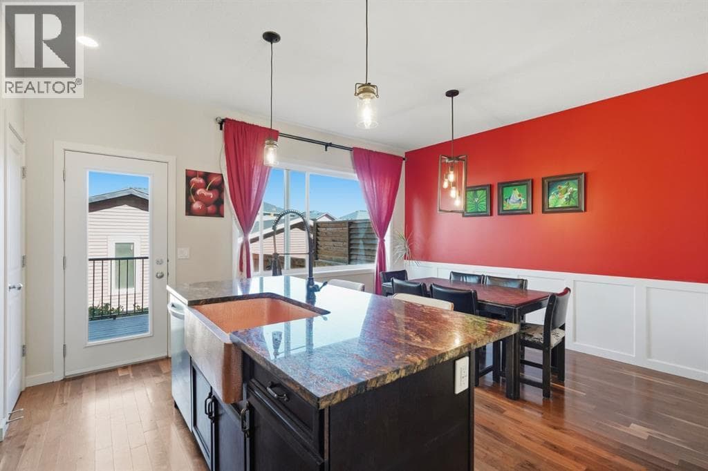 Single Family at 110 Fireside Cove, Cochrane, Alberta - Photo 6 - RE/MAX Garden City Realty
