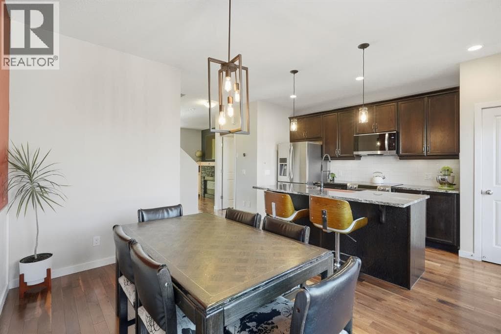 Single Family at 110 Fireside Cove, Cochrane, Alberta - Photo 9 - RE/MAX Garden City Realty