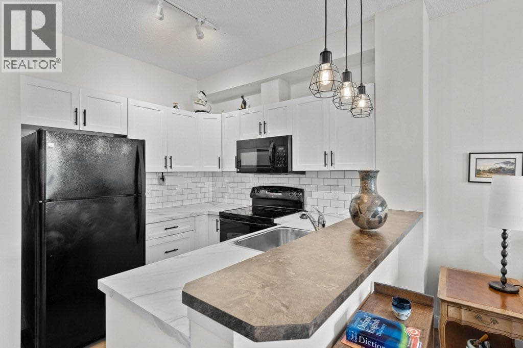 Single Family at 201 Sunset Drive, Cochrane, Alberta - Photo 8 - RE/MAX Garden City Realty